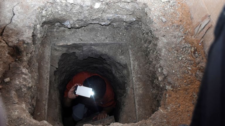 A journalist exits a 40-meter tunnel, through which 29 inmates escaped from a prison, according to local media, in Ciudad Victoria, in Tamaulipas state, Mexico March 24, 2017
