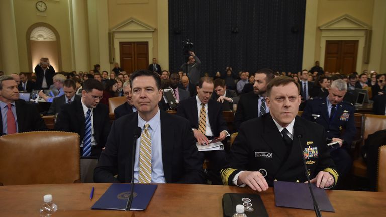 FBI Director James Comey(L) and National Security Agency Director Mike Rogers(R) arrive to speak during the House Permanent Select Committee on Intelligence hearing on Russian actions during the 2016 election campaign on March 20, 2017
