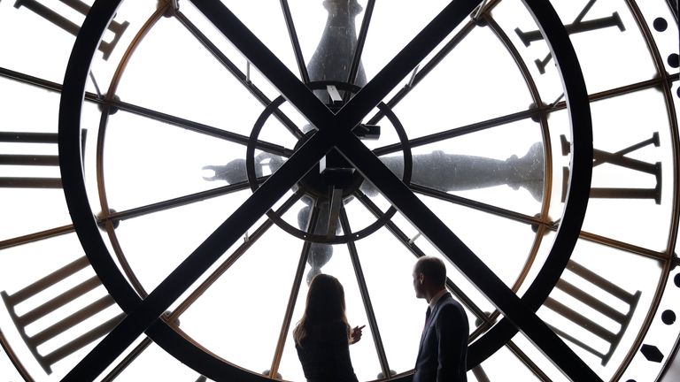The Duke and Duchess of Cambridge look through the clock at Musee d&#39;Orsay in Paris