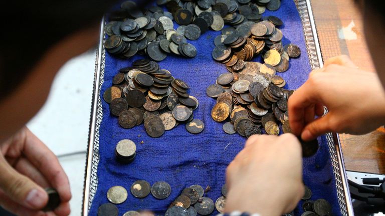 Coins removed from a sea turtle in Thailand