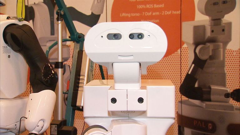 Scientists have showcased "socially-intelligent" robots which they believe will help tackle loneliness.
