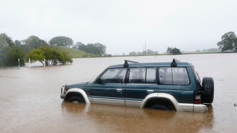 A car in flood waters in Murwillumbah