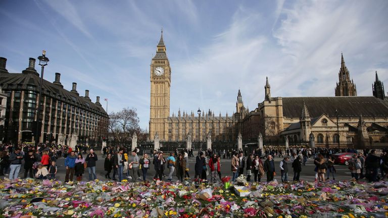 Floral tributes to the victims of the March 22 terror attack are seen in Parliament Square in central London on March 26, 2017. British police investigating the terror attack on parliament made a new arrest on March 26 as authorities try to piece together the assailant&#39;s motive. / AFP PHOTO / Daniel LEAL-OLIVAS (Photo credit should read DANIEL LEAL-OLIVAS/AFP/Getty Images)