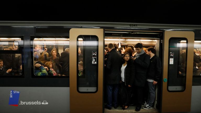 Passengers observe a minute&#39;s silence on the Brussels metro