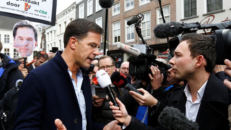 Dutch Prime Minister Mark Rutte of the VVD Liberal party speaks to the media as he campaigns for the 2017 Dutch election in Breda, Netherlands March 11, 2017