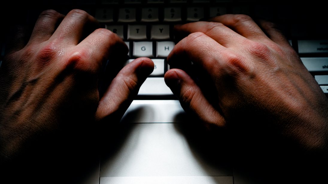 A criminal using a computer to commit crime