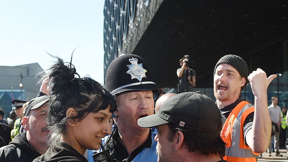 Saffiyah Khan faces down an EDL protester at a demonstration in Birmingham