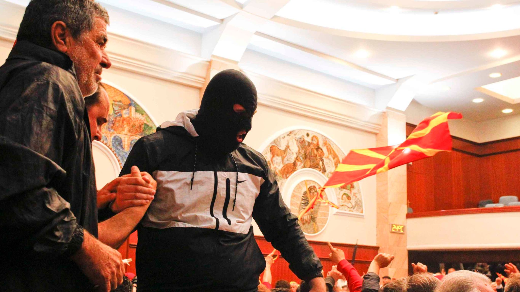 Protesters storm into Macedonia parliament and attack politicians