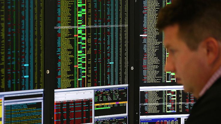A trader looks at economic data