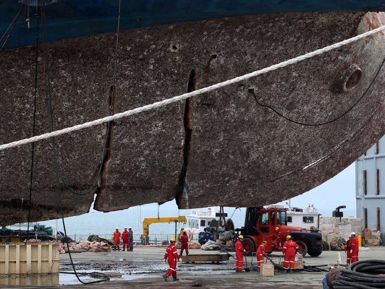 The sunken ferry Sewol sits on a semi-submersible transport vessel arrived at a port in Mokpo, South Korea