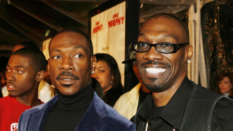 Charlie Murphy (R) co-wrote Norbit, which starred his younger brother Eddie