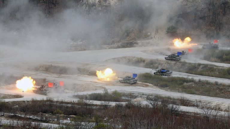 South Korean Army K1A1 and U.S. Army M1A2 tanks fire live rounds during a U.S.-South Korea joint live-fire military exercise at a training field near the DMZ in Pocheon