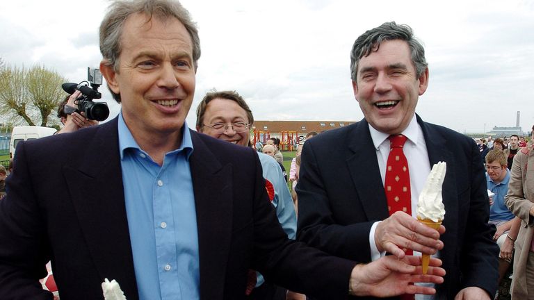General Election Campaign 2005 - Tony Blair hands Gordon Brown a '99' ice cream during a visit to a park in Merton