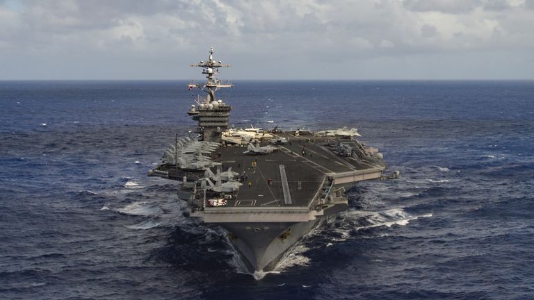 The supercarrier is now headed from Singapore to the Western Pacific Ocean