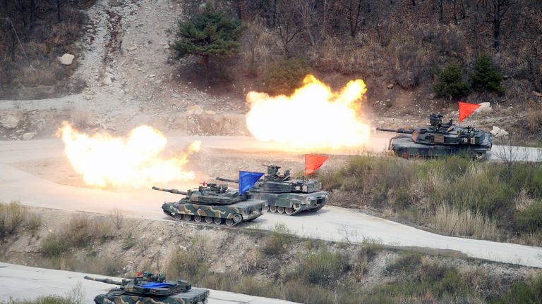 South Korean Army K1A1 and U.S. Army M1A2 tanks fire live rounds during a U.S.-South Korea joint live-fire military exercise at a training field near the DMZ in Pocheon