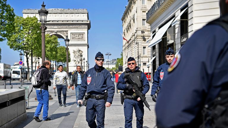 Armed police patrol the Champs Elysees 