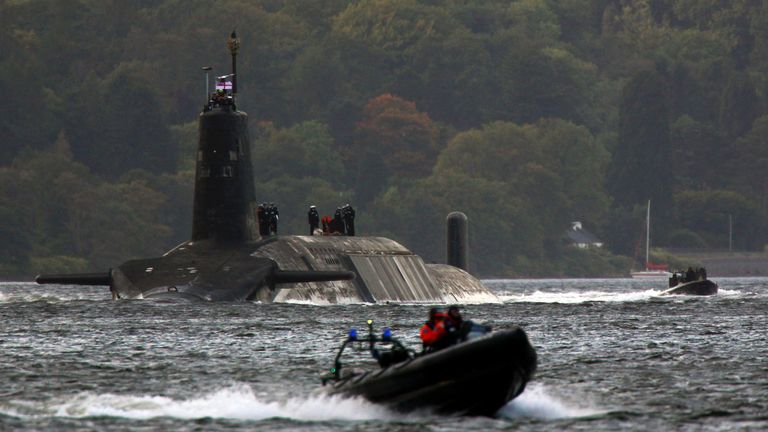  A trident submarine makes it's way out from Faslane Naval base 