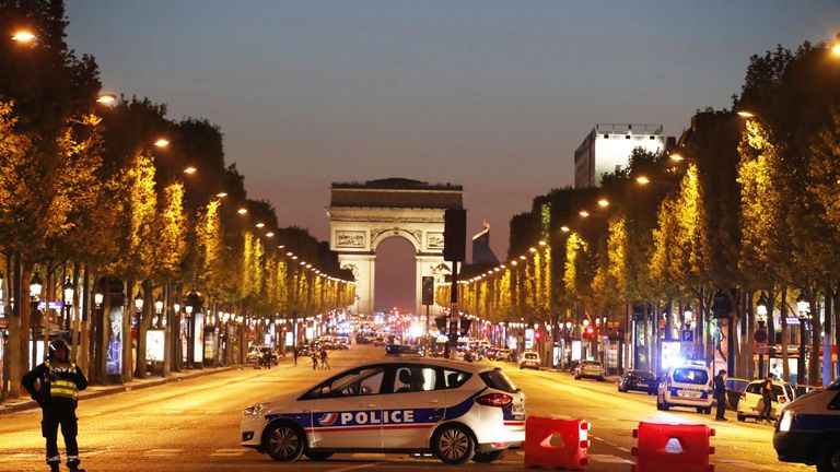 The attacker opened fire on a police car parked on the Champs-Elysees before he was also shot dead