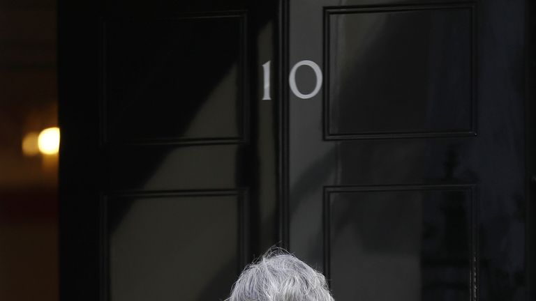 Theresa May returns to 10 Downing Street after calling for a snap General Election