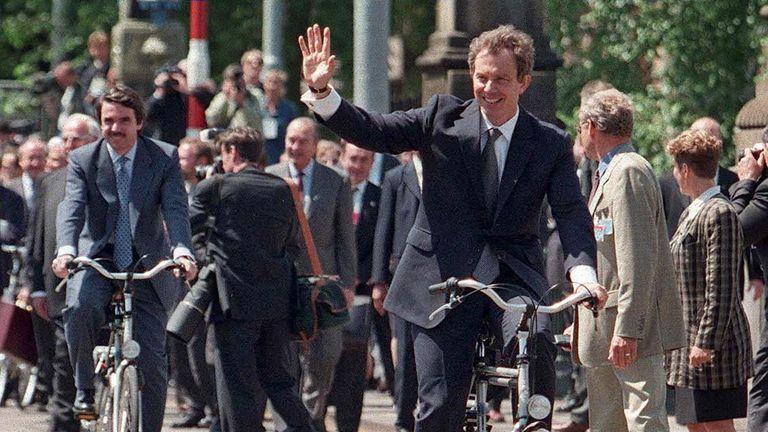 Tony Blair leads the pack as the EU leaders enjoy a short bike ride in Amsterdam, 1997