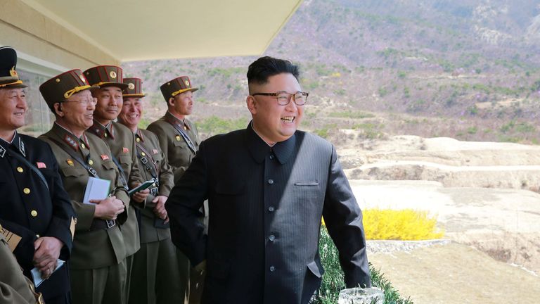 North Korean Leader Kim Jong Un observes a target-striking contest