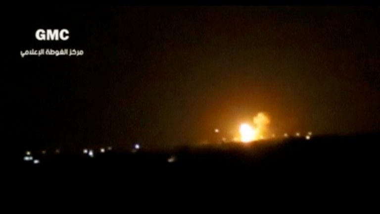 This image appears to show an explosion after a missile strike near an airport in Damascus
