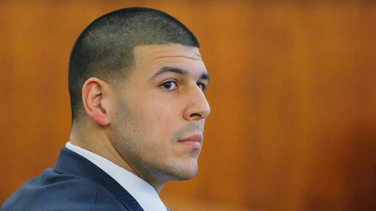 Former New England Patriots player Aaron Hernandez listens to testimony, during his murder trial at Bristol County Superior Court in Fall River, Massachusetts, February 24, 2015
