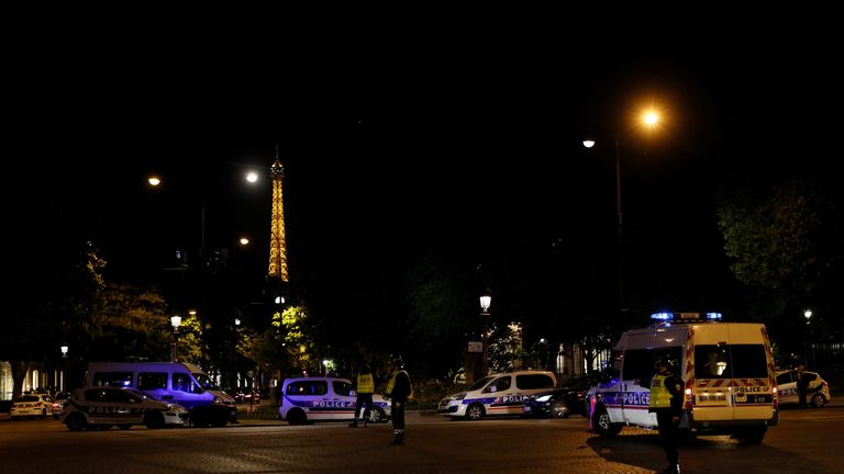 Police vehicles seen near the Eiffel Tower