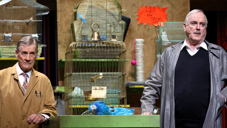 Michael Palin and John Cleese perform the famous parrot scene in  &#39;Monty Python Live (Mostly)&#39; in 2014
