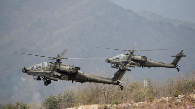 U.S. Army&#39;s AH-64 Apache helicopters fire during U.S.-South Korea joint live-fire military exercise at a training field near the DMZ in Pocheon
