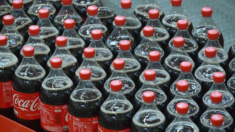 Plastic bottles of Coca-Cola on a production line