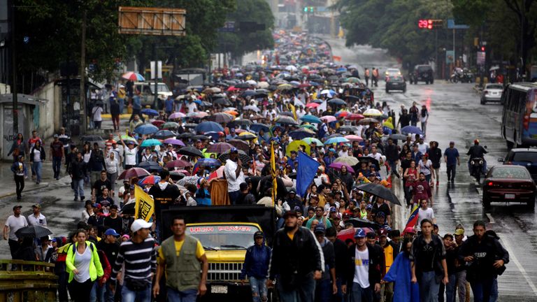 Demonstrators rally against Venezuela's President Nicolas Maduro in Caracas, Venezuela
