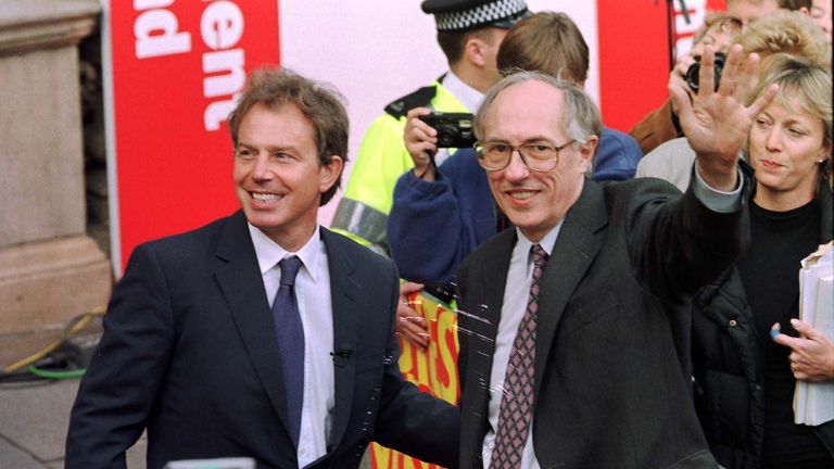 Tony Blair arrives with Scottish secretary Donald Dewar in Edingburgh