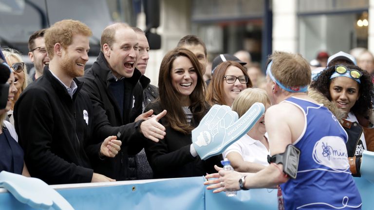 The Duke and Duchess of Cambridge and Prince Harry cheered on runners