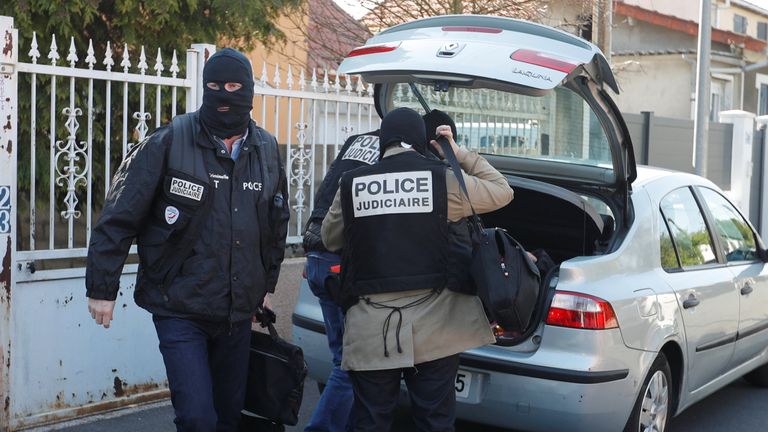 French police arrive at the house of the gunman 