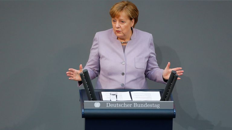 Angela Merkel addressing the lower house of Germany's Parliament on Thursday