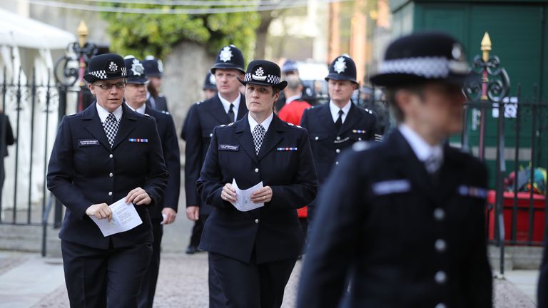 Police officers attend a service to remember their fallen colleague PC Keith Palmer