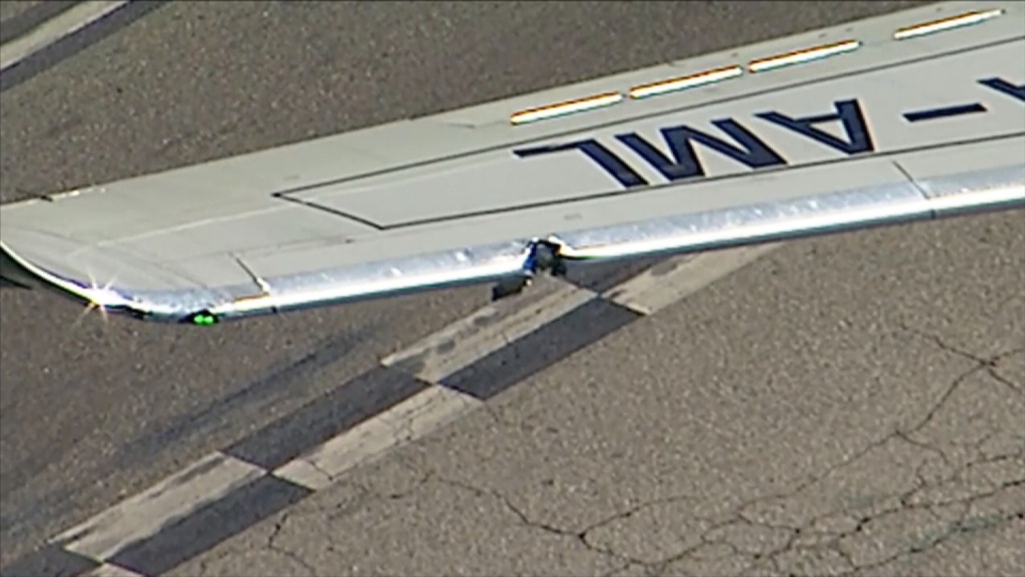 Injuries after jet's wing flips truck on Los Angeles airport runway