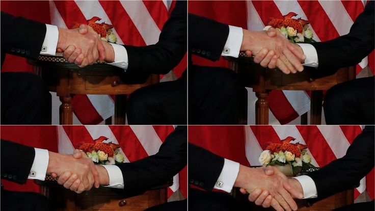 Trump (L) and Macron handshake