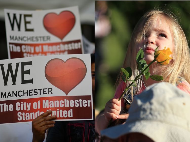 Three-year-old Ruby Tindall watches from her father Lee's shoulders during a vigil to commemorate the victims of the May 22 attack on Manchester Arena