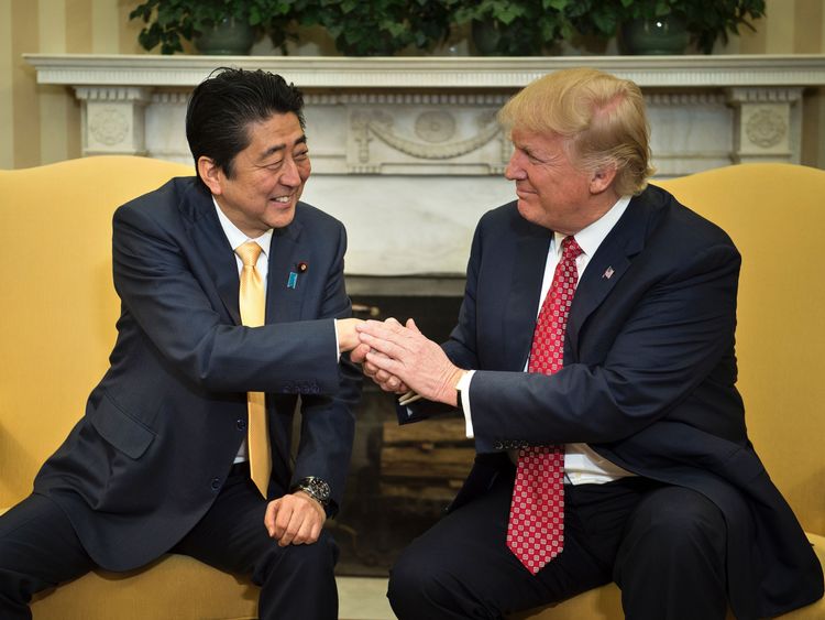 Trump and Abe handshake
