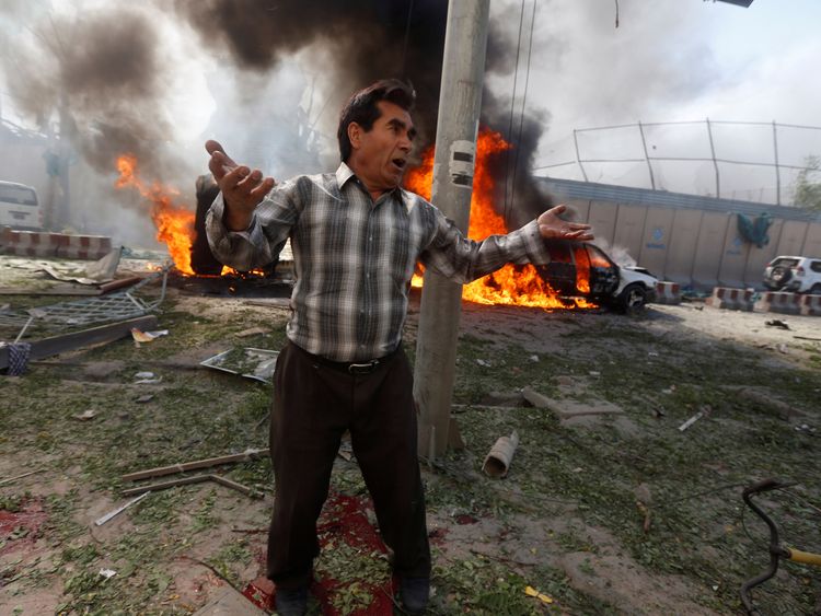 An Afghan man near the site of the car bomb