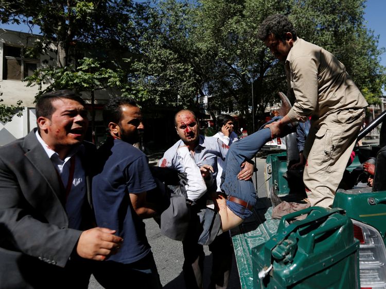 Vehicles carrying the wounded pulled up outside hospitals