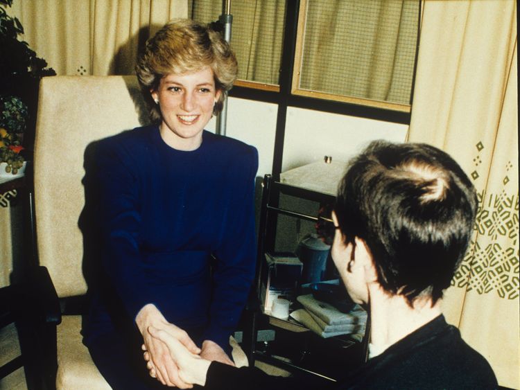 Princess Diana holding the hand of an AIDS patient in Middlesex. REX/Shutterstock