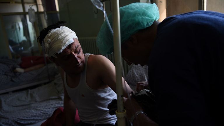 A man receives treatment for his injuries in a Kabul hospital