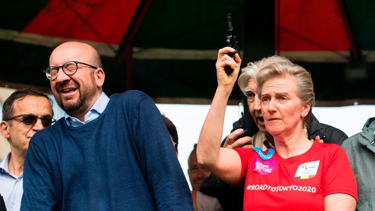 Charles Michel looks shocked as Princess Astrid fires the starting gun