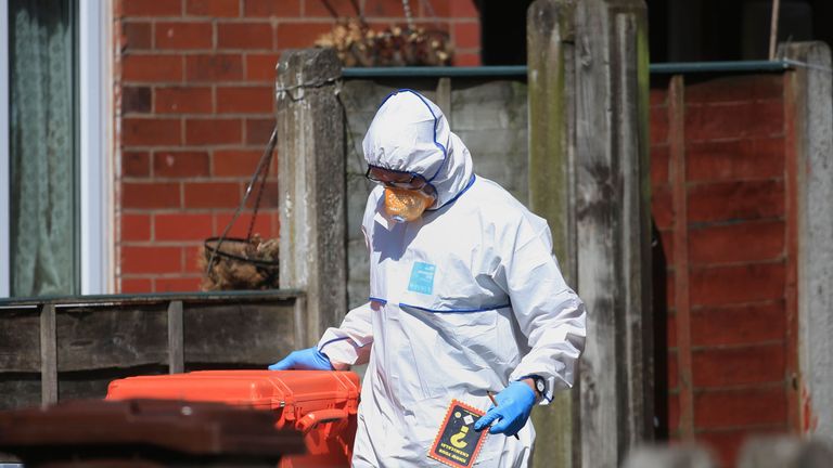 A forensic investigator at a home in Elsmore Road where Salman Abedi was registered as living