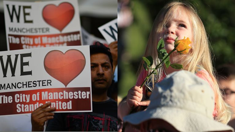 Three-year-old Ruby Tindall watches from her father Lee's shoulders during a vigil to commemorate the victims of the May 22 attack on Manchester Arena