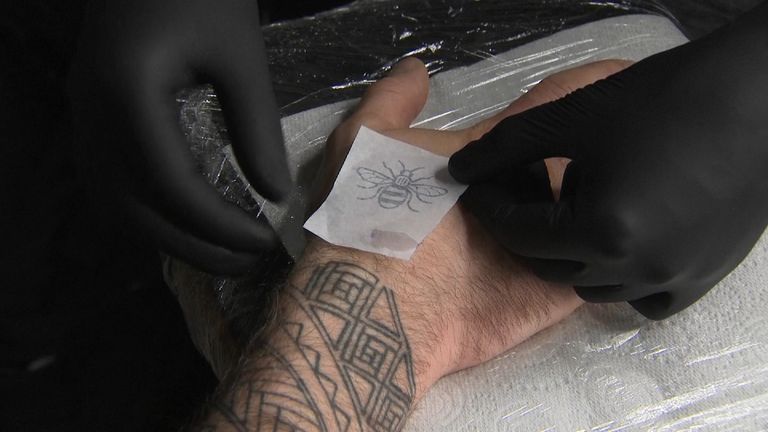 People are queuing up to get bee tattoos in memory of the Manchester bombing victims