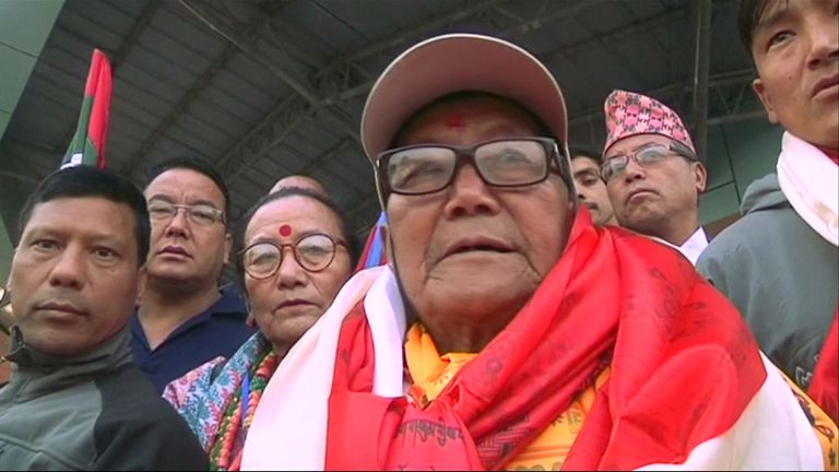 Supporters draped Mr Sherchan with silk scarves before his attempt